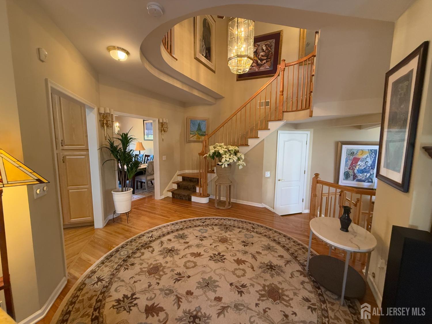 4 Sevell Circle Clark, NJ 07066 - Photo 1 of 33 a view of a livingroom with wooden floor and furniture
