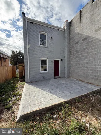 a view of a backyard of a house
