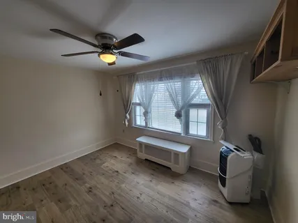 wooden floor and window in a room