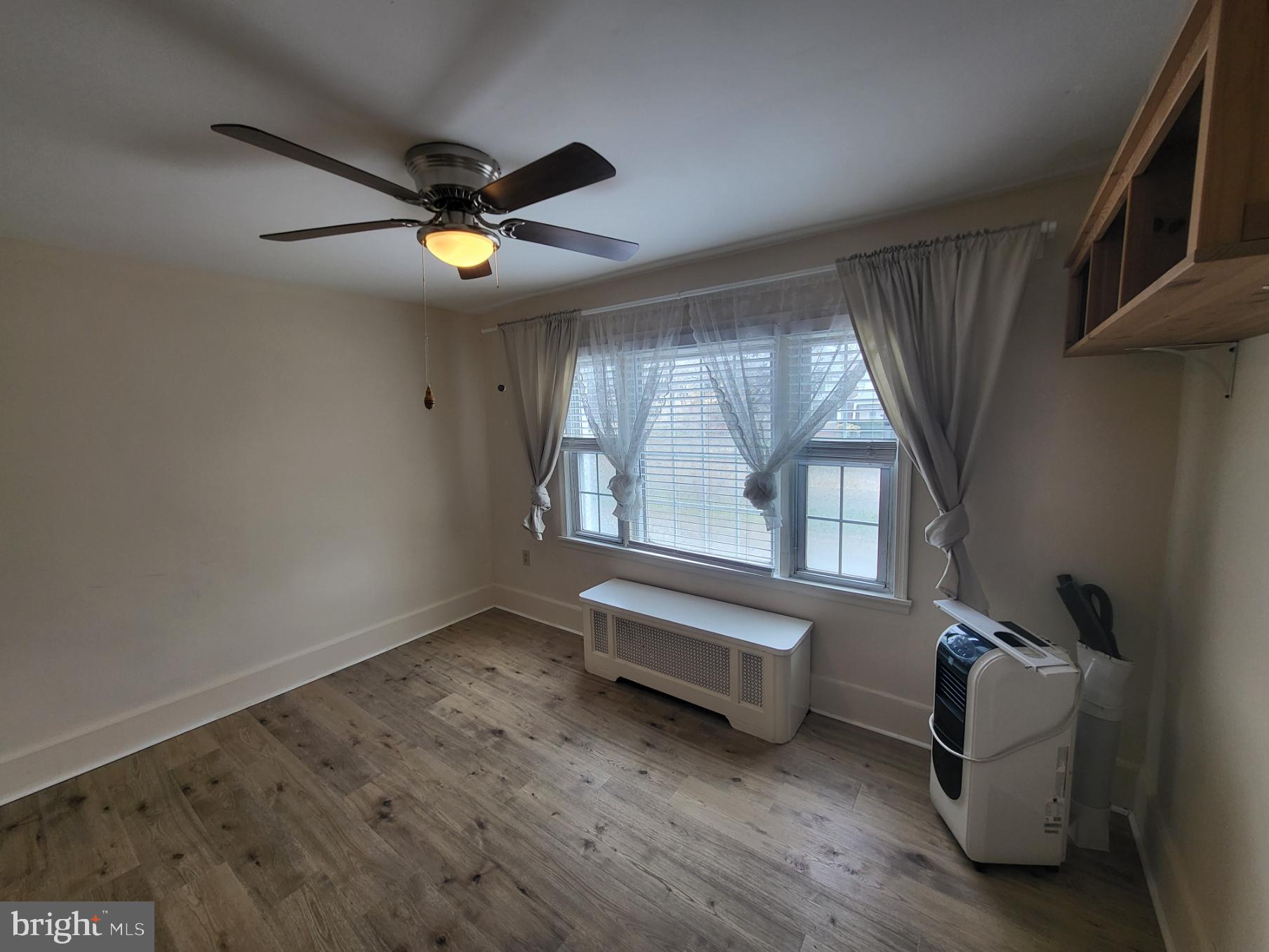 2122 Darby Road Havertown, PA 19083 - Photo 2 of 15 wooden floor and window in a room