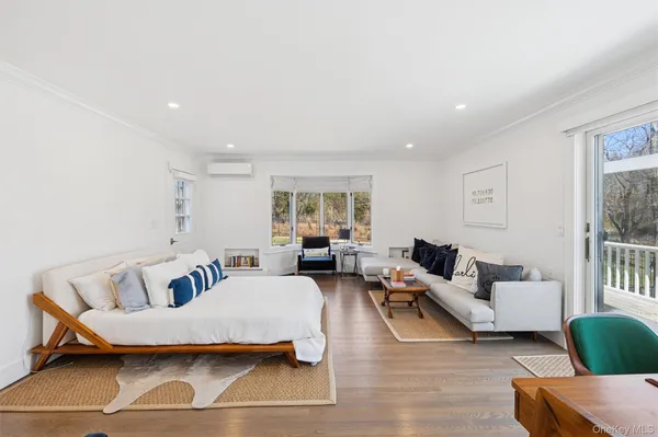 a living room with furniture and a couch