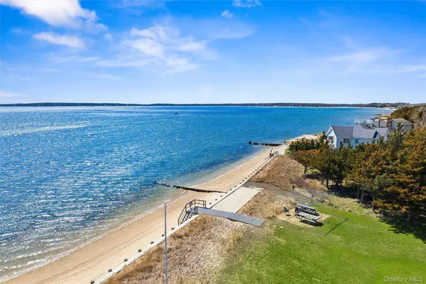 a view of a lake with a yard