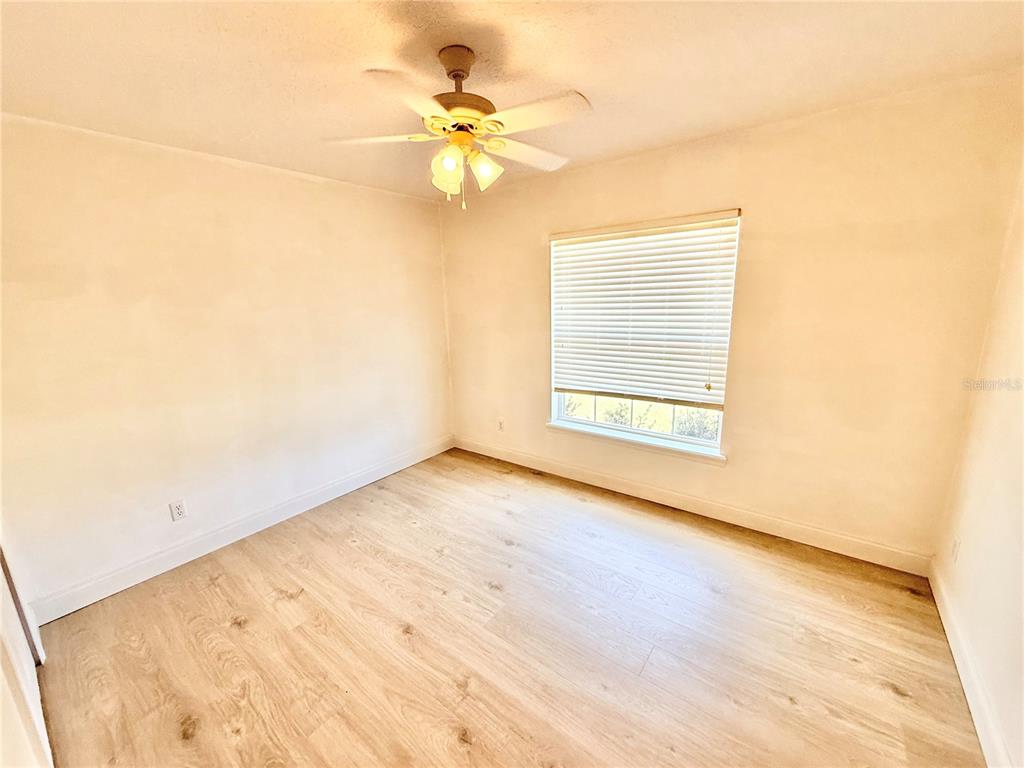 1220 Myrtle Avenue St. Cloud, FL 34771 - Photo 16 of 59 an empty room with a empty space and a window