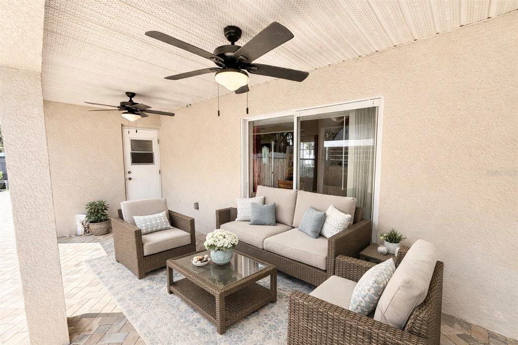 1220 Myrtle Avenue St. Cloud, FL 34771 - Photo 24 of 59 a living room with furniture a ceiling fan and a window