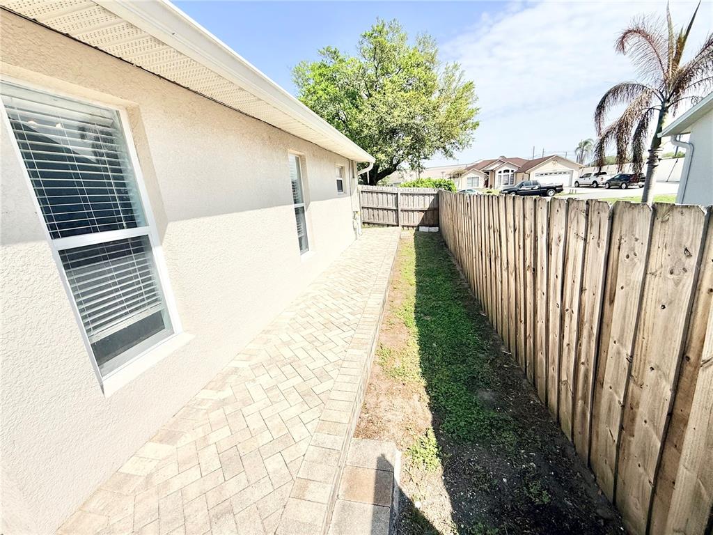 1220 Myrtle Avenue St. Cloud, FL 34771 - Photo 36 of 59 a view of a backyard with pathway
