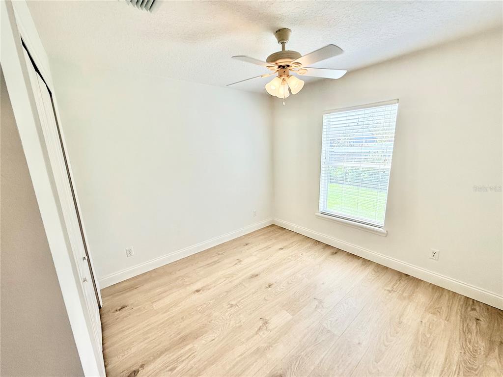 1220 Myrtle Avenue St. Cloud, FL 34771 - Photo 39 of 59 an empty room with a window