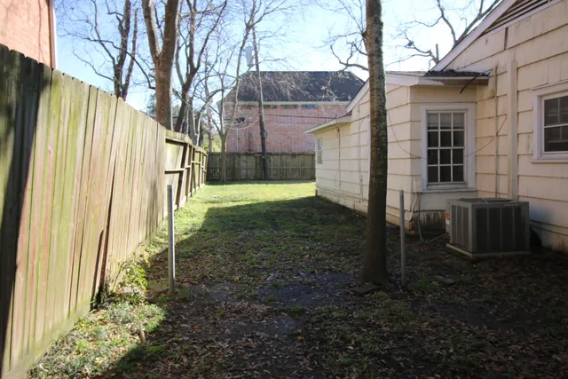 an aerial view of a house with pool patio and outdoor seating