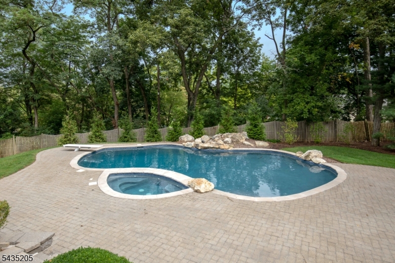 12 Oak Hill Road Bernards, NJ 07920 - Photo 3 of 33 a view of swimming pool with a yard and trees