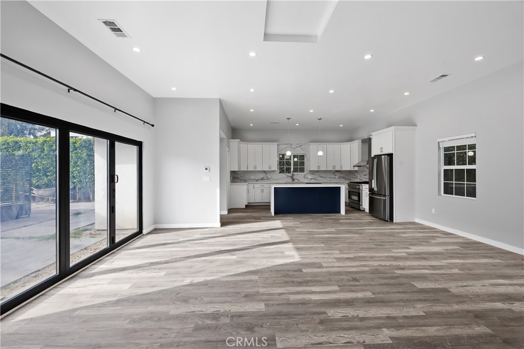 19613 Lanark Street, Unit 1/4 Reseda, CA 91335 - Photo 15 of 38 a view of kitchen with refrigerator and window