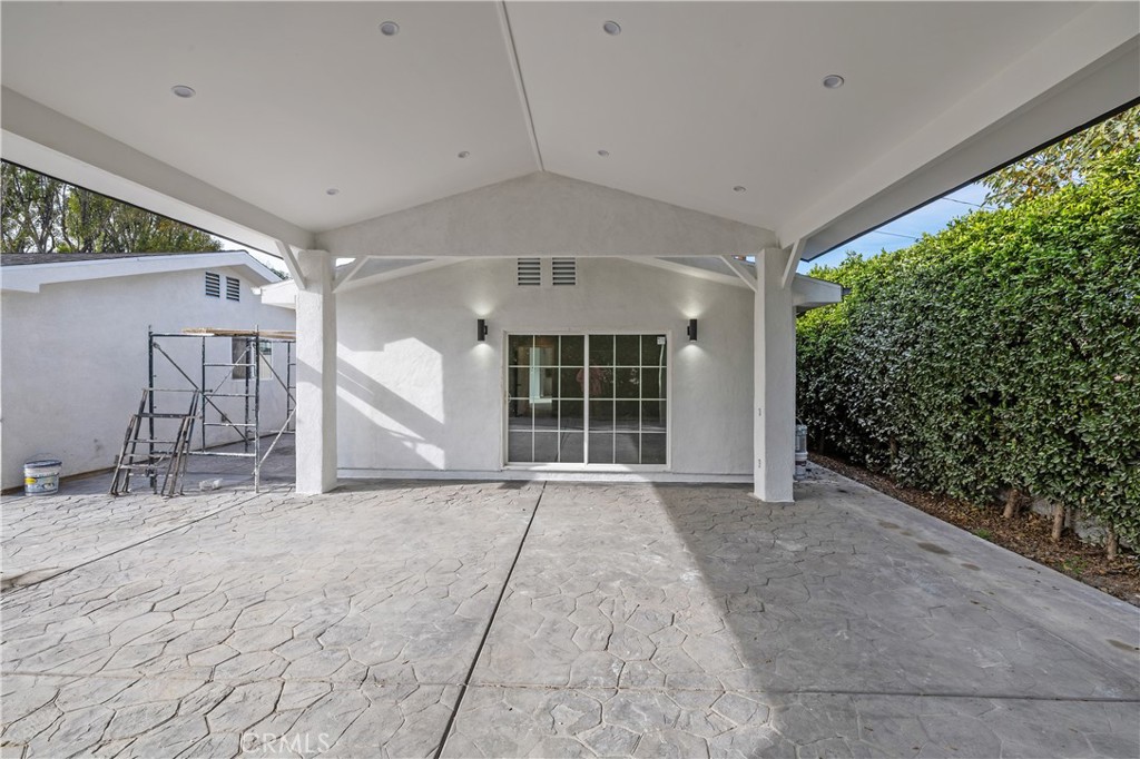 19613 Lanark Street, Unit 1/4 Reseda, CA 91335 - Photo 34 of 38 a view of an empty room with a window