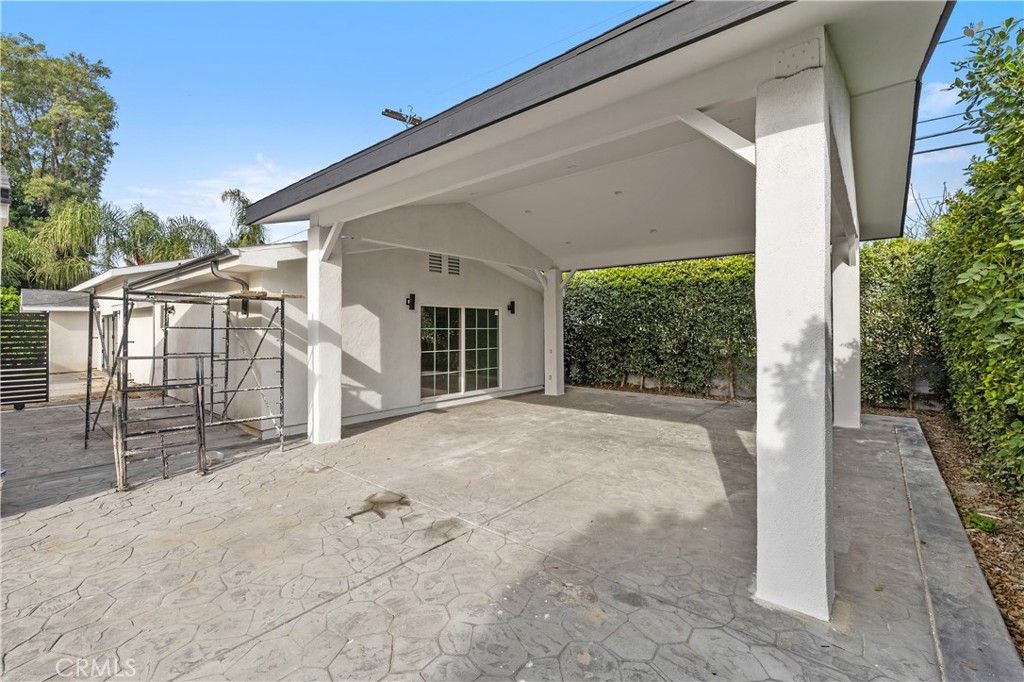 19613 Lanark Street, Unit 1/4 Reseda, CA 91335 - Photo 35 of 38 a view of a house with a outdoor space