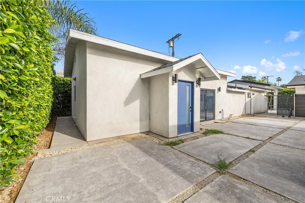 19613 Lanark Street, Unit 1/4 Reseda, CA 91335 - Photo 38 of 38 a view of a house with a outdoor space