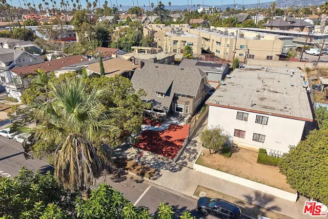 an aerial view of a house with a ocean view