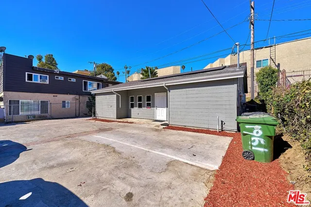 a front view of a house with a garage