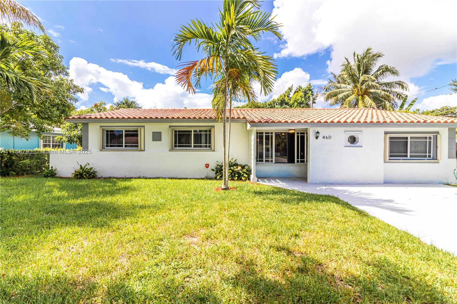 460 Northwest 88th Terrace El Portal, FL 33150 - Photo 1 of 22 a house with a swimming pool