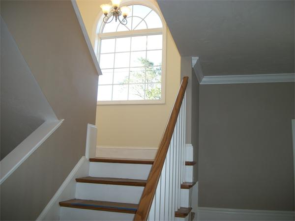 72 Mountford Road Hull, MA 02045 - Photo 11 of 30 a view of staircase with wooden floor and fan