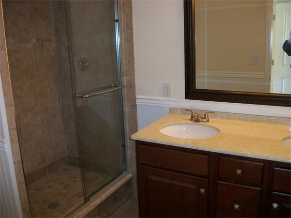 72 Mountford Road Hull, MA 02045 - Photo 18 of 30 a bathroom with a sink and a mirror