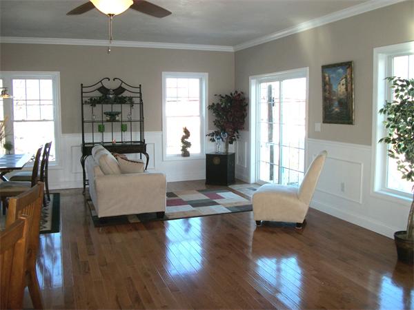 72 Mountford Road Hull, MA 02045 - Photo 9 of 30 a living room with fireplace furniture and a wooden floor