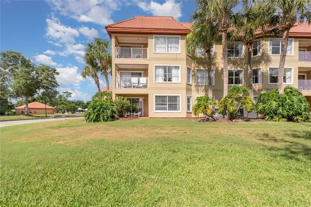 a front view of a building with garden