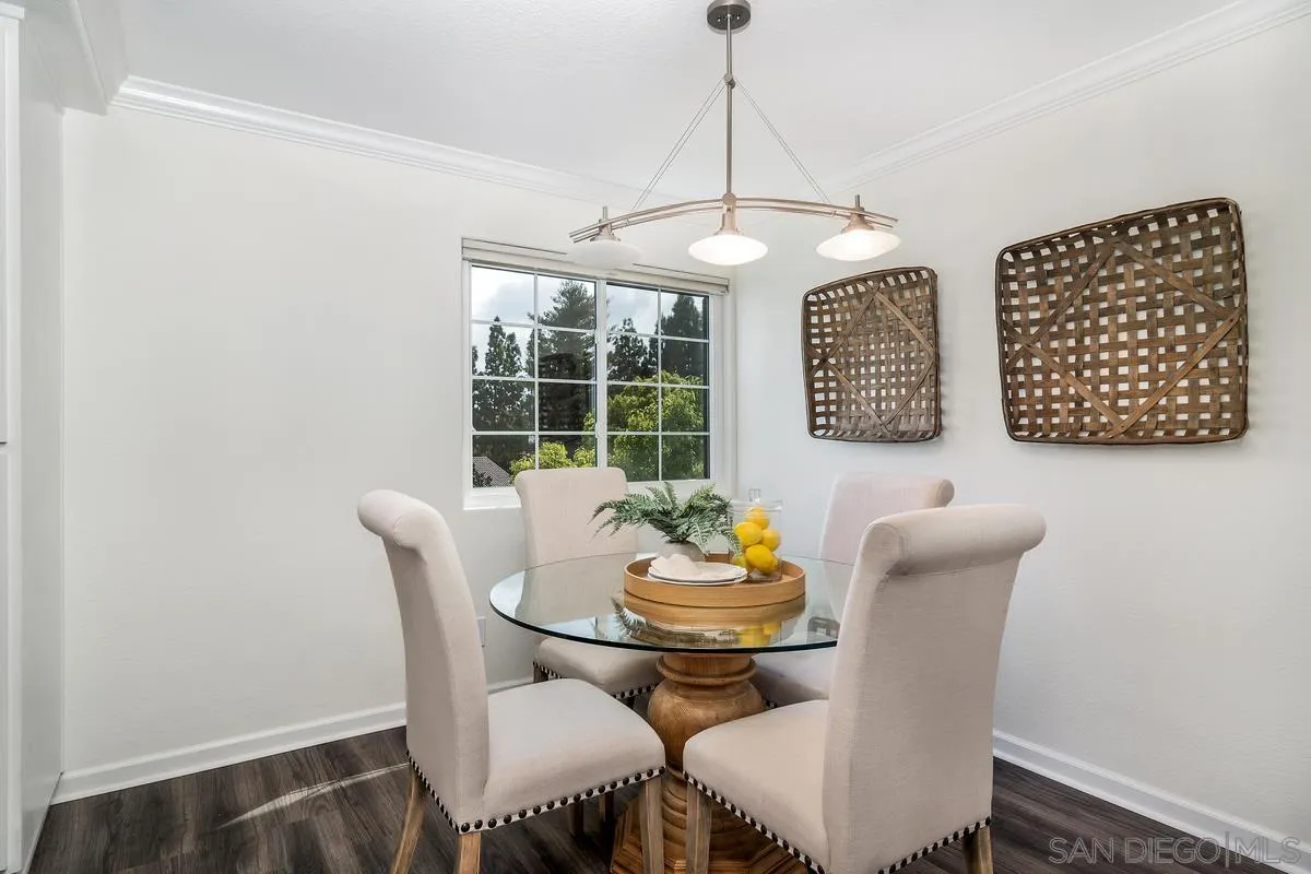 16470 Avenida Venusto, Unit F Rancho Bernardo, CA 92128 - Photo 11 of 30 a view of a dining room with furniture window and outside view