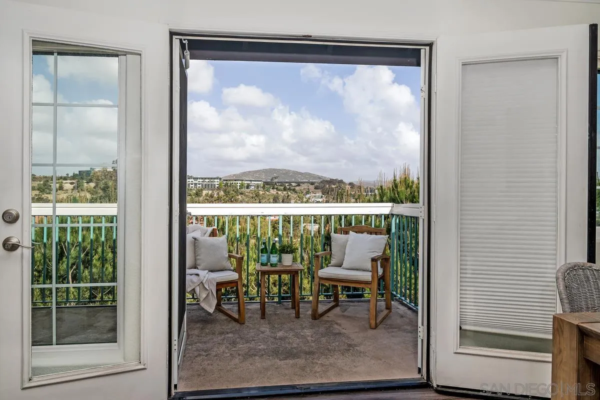 16470 Avenida Venusto, Unit F Rancho Bernardo, CA 92128 - Photo 14 of 30 a view from a back yard from a porch