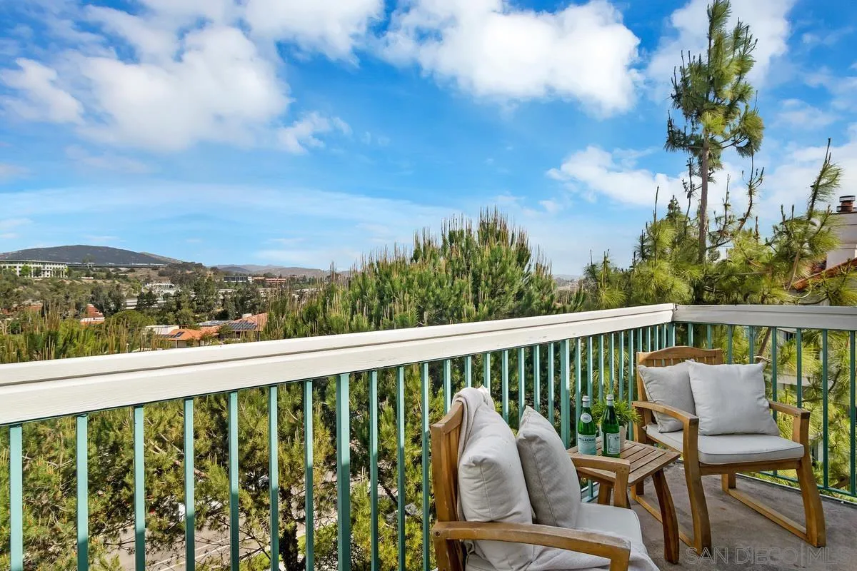 16470 Avenida Venusto, Unit F Rancho Bernardo, CA 92128 - Photo 16 of 30 a view of a chair in a balcony