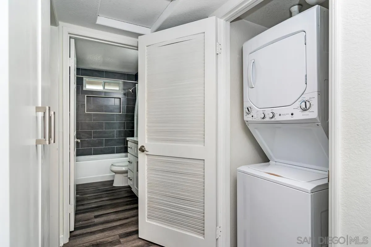 16470 Avenida Venusto, Unit F Rancho Bernardo, CA 92128 - Photo 26 of 30 a bathroom with a toilet and a shower