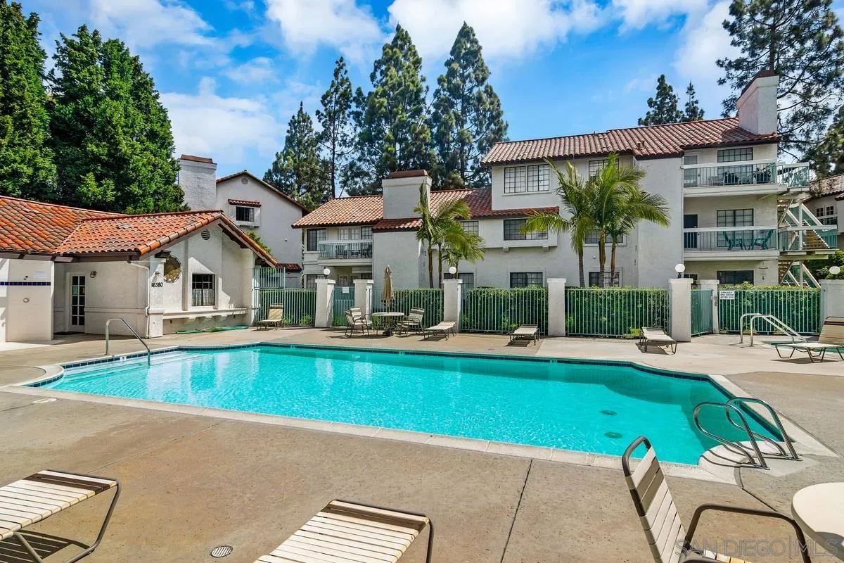 16470 Avenida Venusto, Unit F Rancho Bernardo, CA 92128 - Photo 28 of 30 a view of house with swimming pool yard and outdoor seating