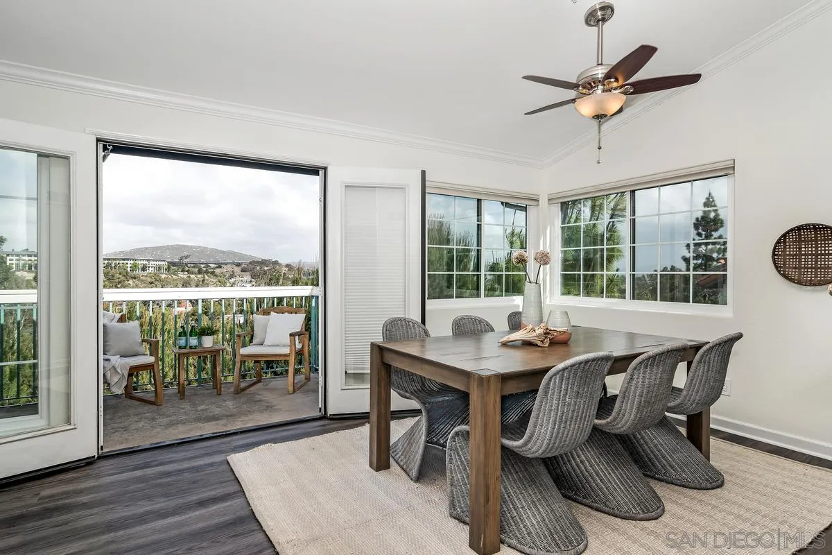 16470 Avenida Venusto, Unit F Rancho Bernardo, CA 92128 - Photo 6 of 30 a view of a dining room with furniture window and wooden floor