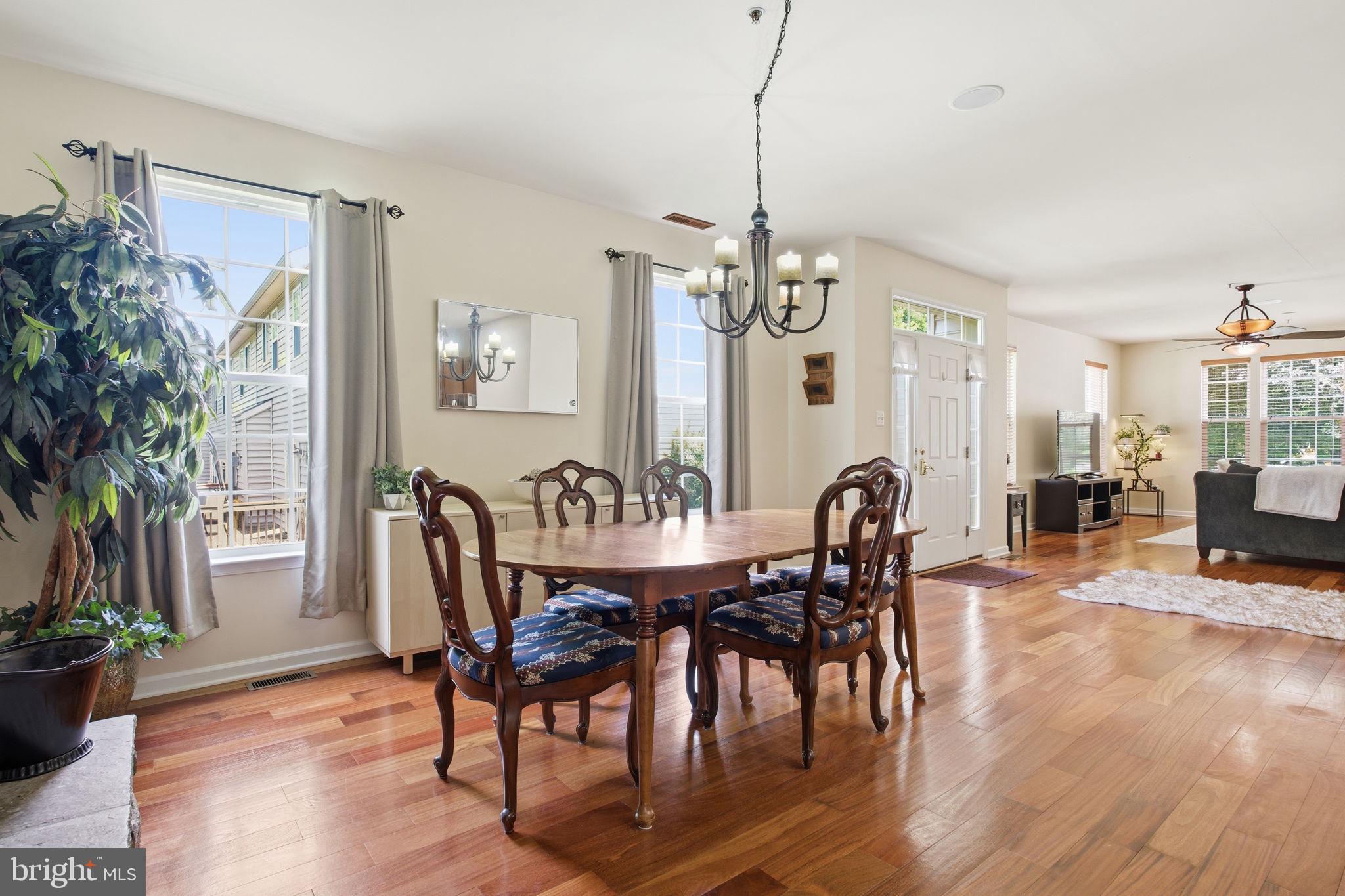 800 Rustic Court Perryville, MD 21903 - Photo 14 of 35 a view of a dining room with furniture window and wooden floor