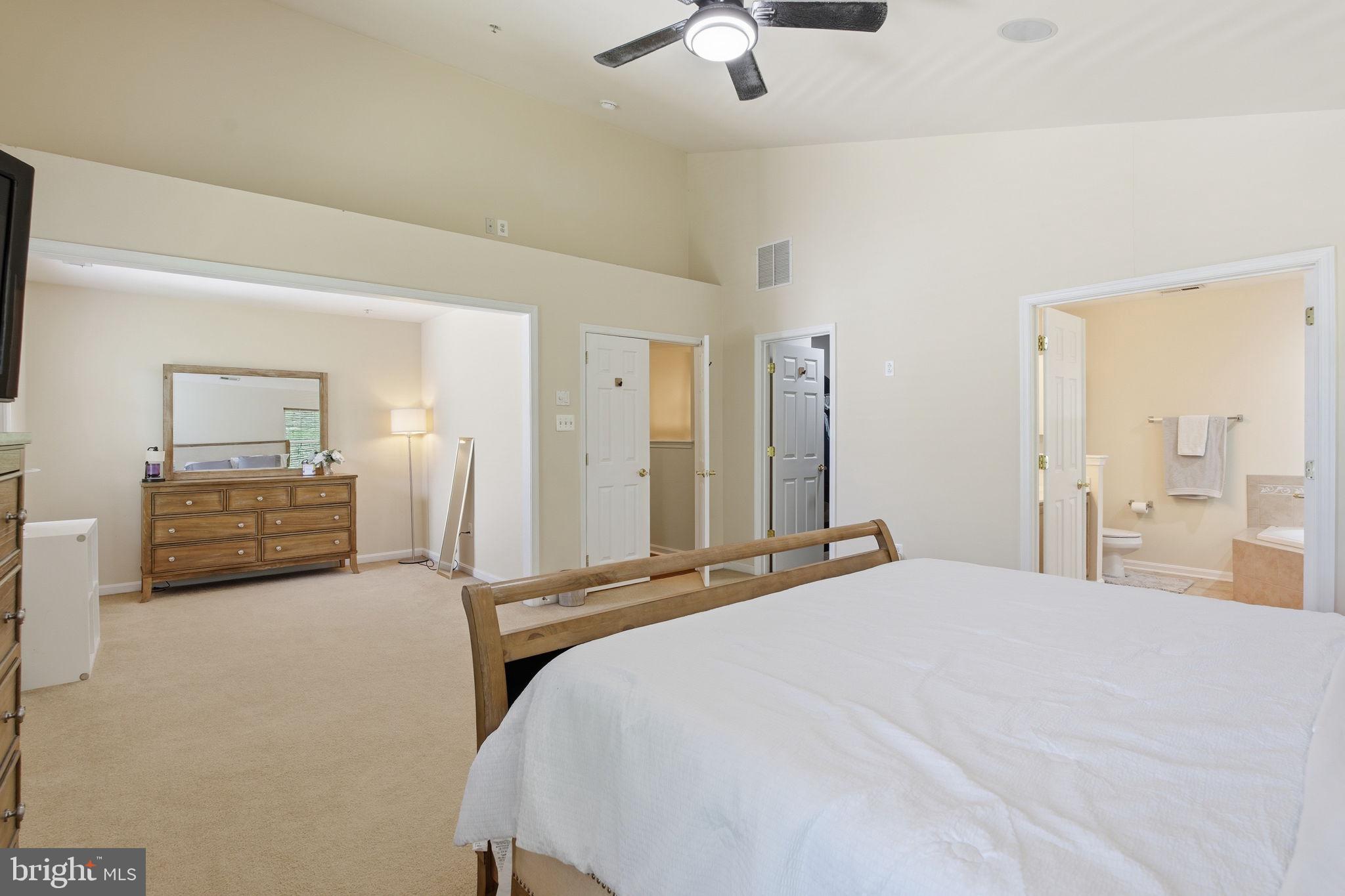 800 Rustic Court Perryville, MD 21903 - Photo 24 of 35 a bedroom with a bed and a chandelier