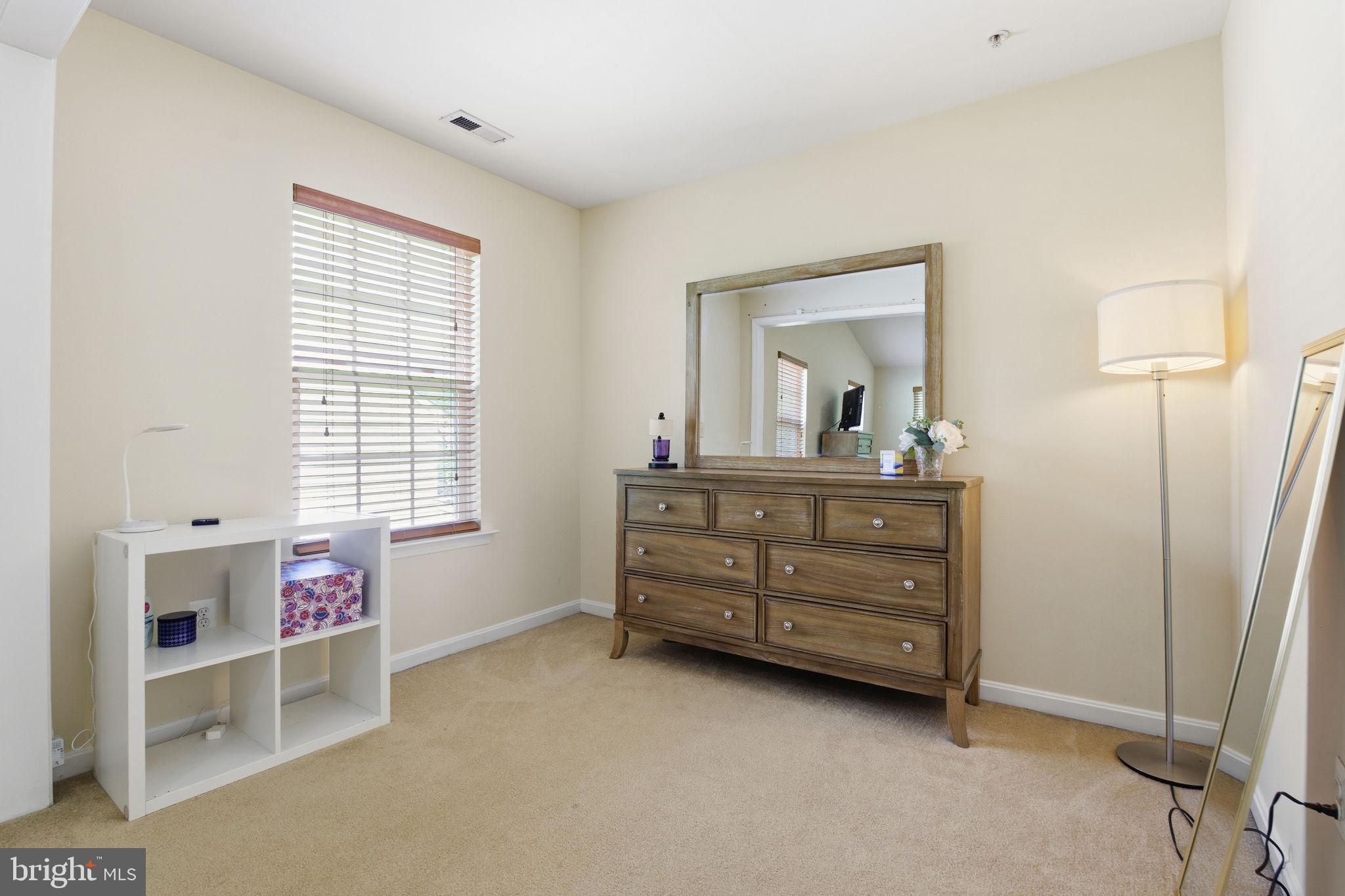 800 Rustic Court Perryville, MD 21903 - Photo 29 of 35 a room with a dresser and a window