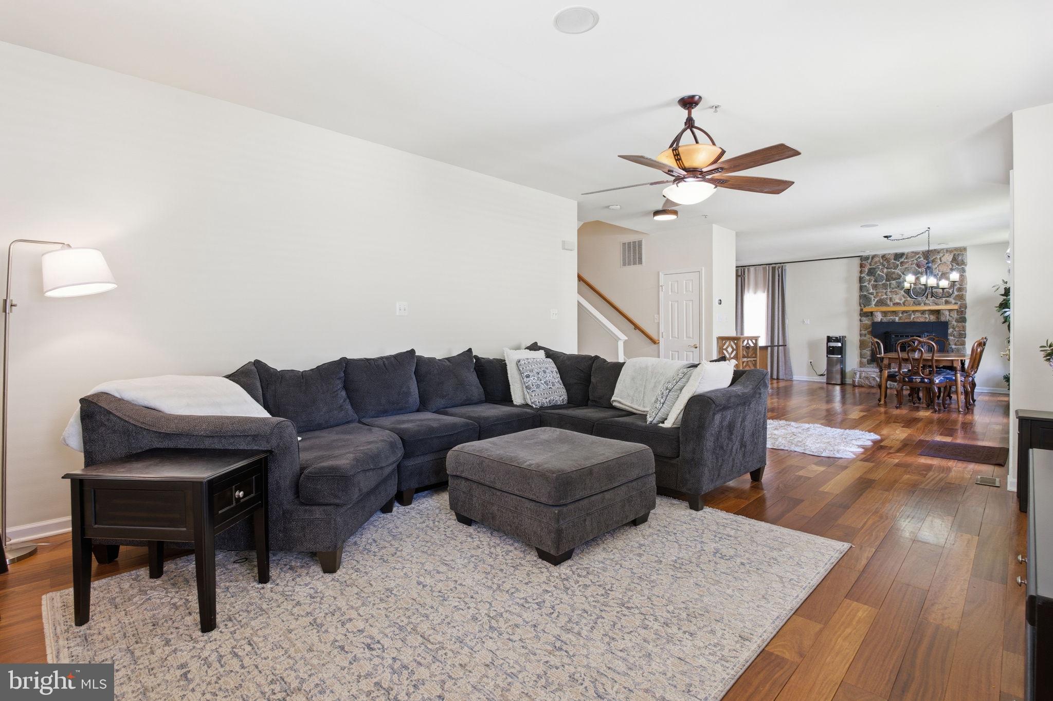 800 Rustic Court Perryville, MD 21903 - Photo 5 of 35 a living room with furniture a ceiling fan and a rug