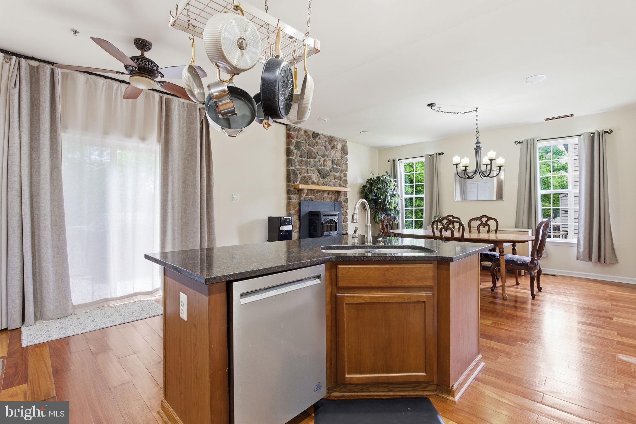 800 Rustic Court Perryville, MD 21903 - Photo 10 of 35 a kitchen with stainless steel appliances granite countertop a sink and dishwasher a stove with wooden floor
