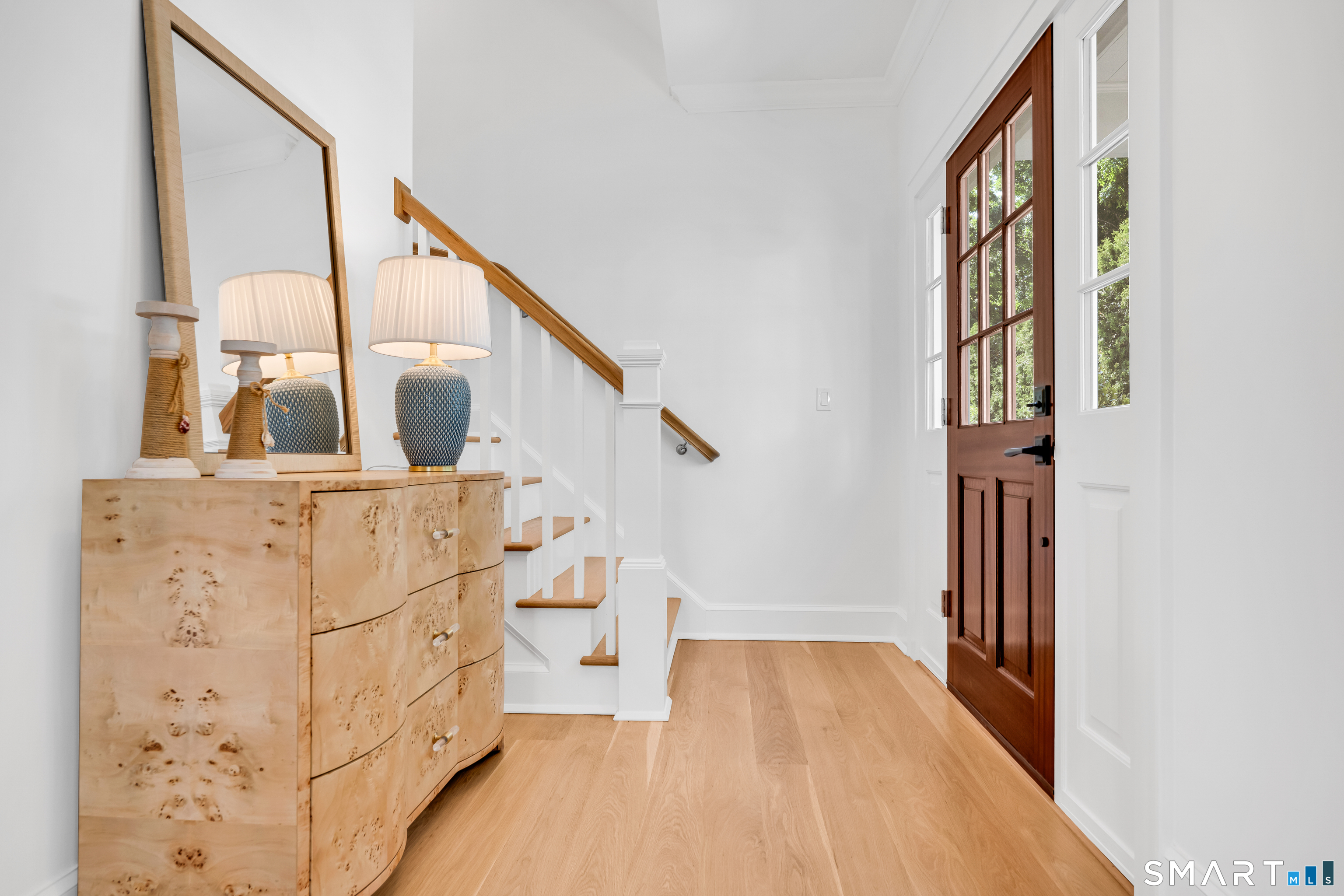 920 Old Post Road Fairfield, CT 06824 - Photo 4 of 40 Beautiful entrance, with mahogany door and select white oak flooring