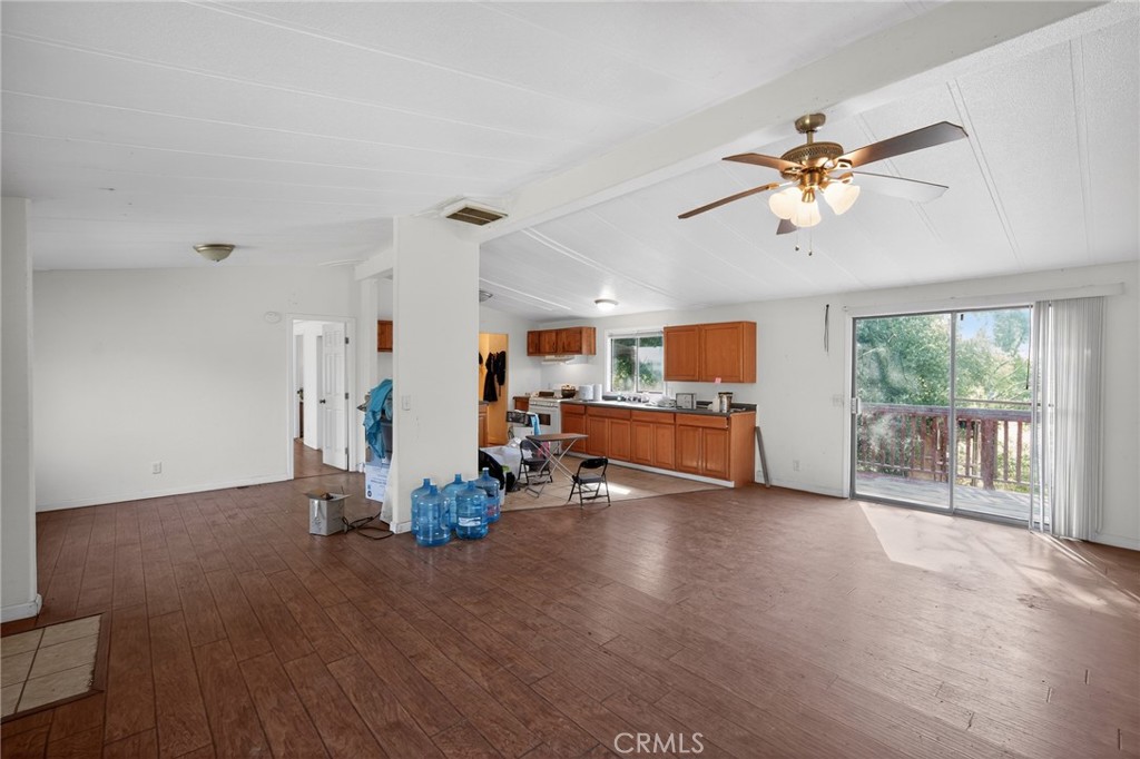 3804 Owl Creek Road Mariposa, CA 95338 - Photo 10 of 18 a view of a livingroom with furniture and a ceiling fan