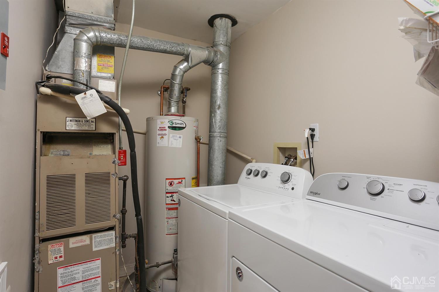 205 Commons Way Drive, Unit 5 East Brunswick, NJ 08816 - Photo 14 of 22 a utility room with dryer and washer