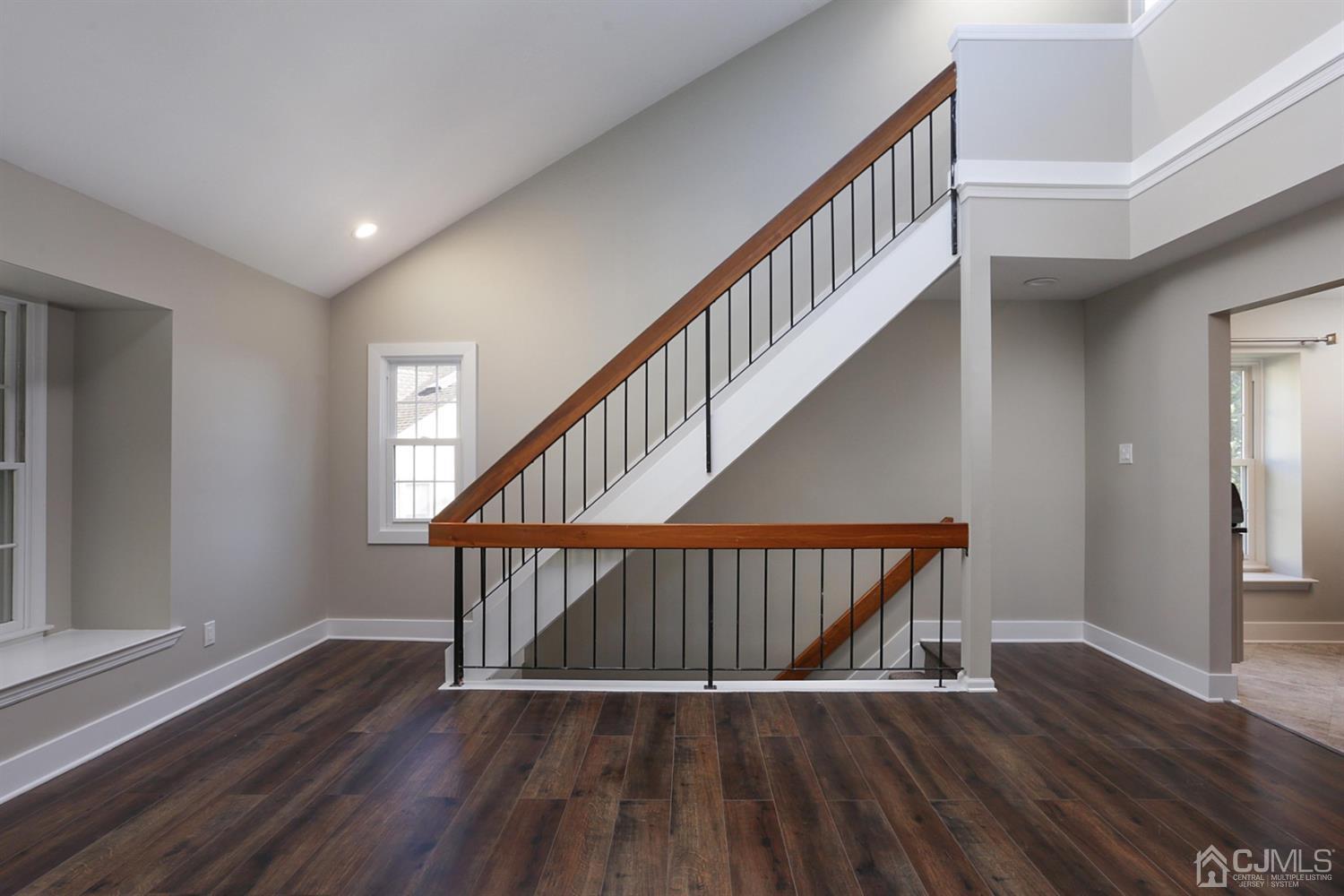 205 Commons Way Drive, Unit 5 East Brunswick, NJ 08816 - Photo 7 of 22 a view of entryway with wooden floor