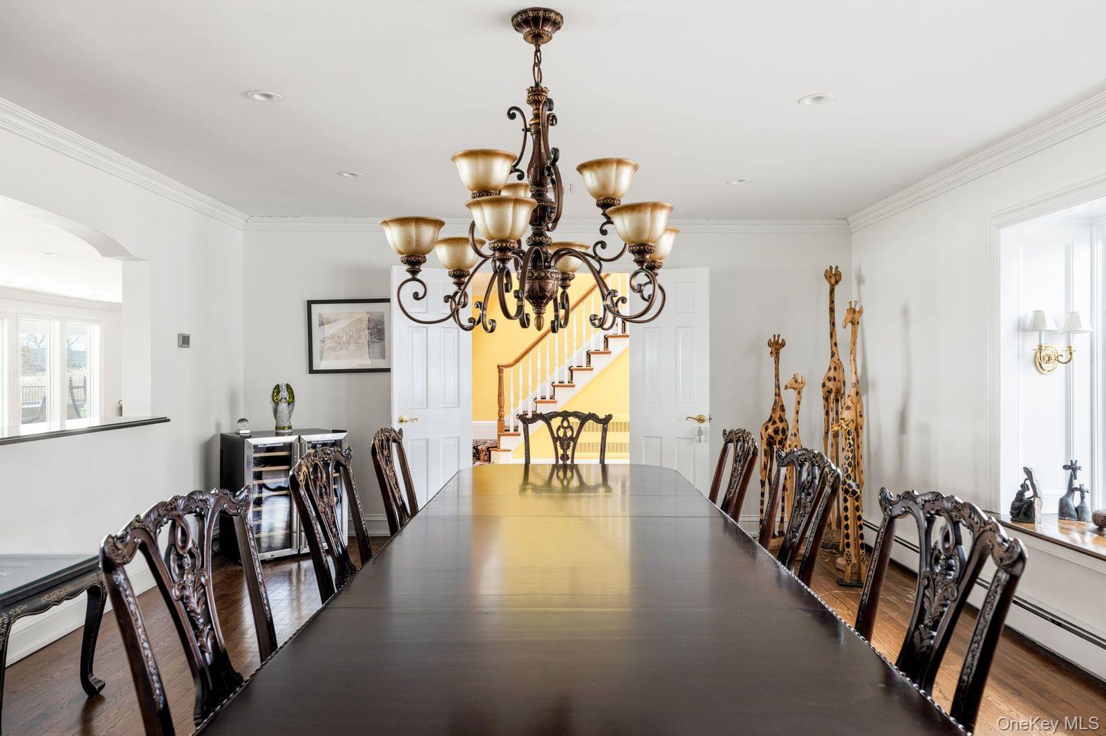 33 Beach Road Northport, NY 11768 - Photo 17 of 50 a view of a dining room with furniture window and wooden floor
