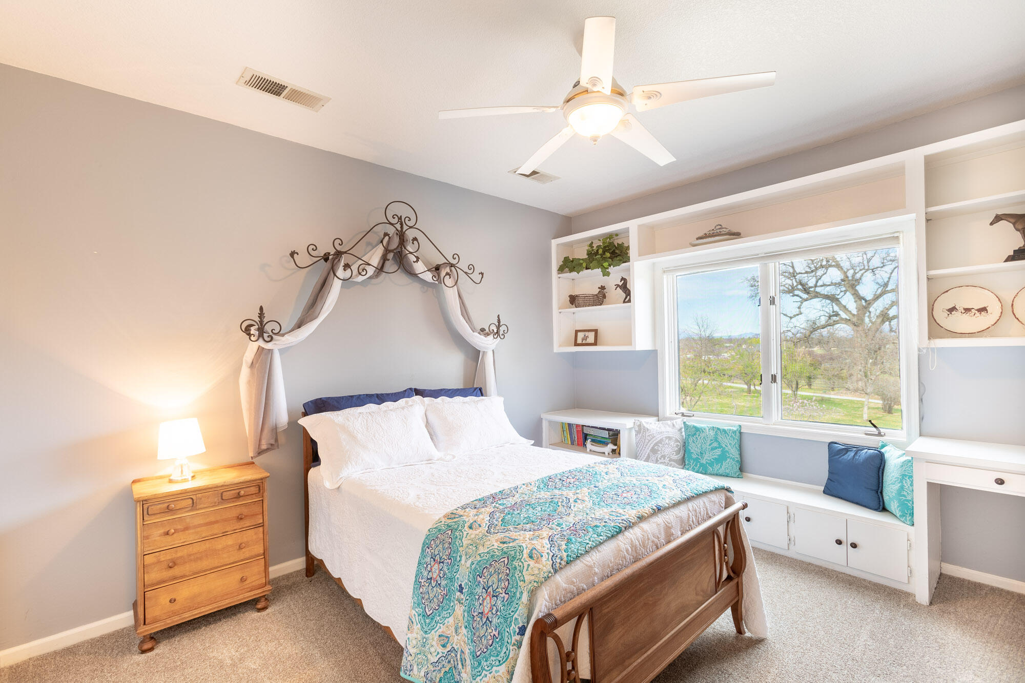 23848 Springwood Way Millville, CA 96062 - Photo 34 of 99 a bedroom with a bed and a window