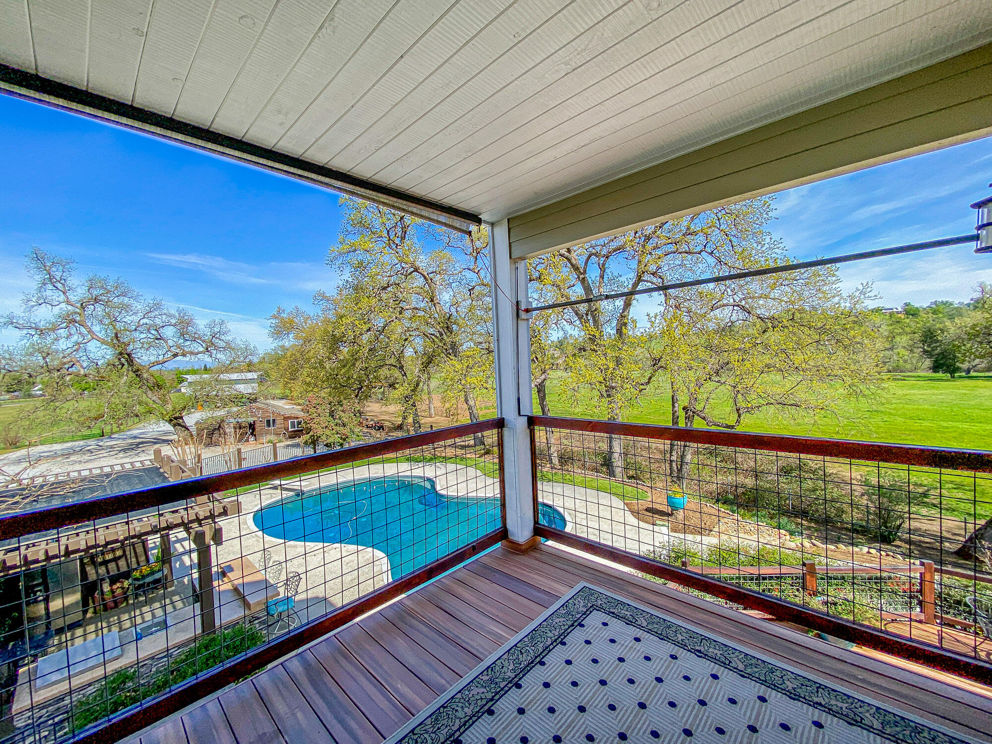 23848 Springwood Way Millville, CA 96062 - Photo 40 of 99 a view of a balcony with lake view and a ocean view