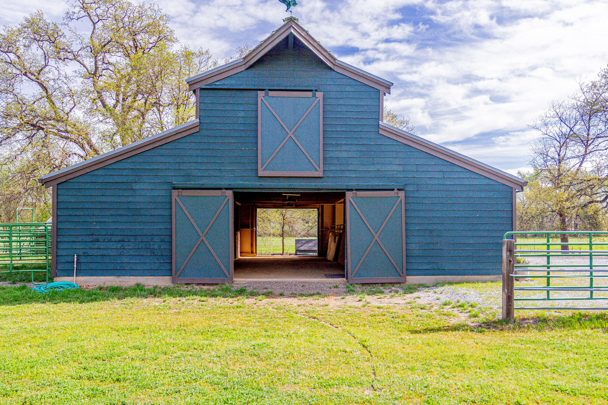 23848 Springwood Way Millville, CA 96062 - Photo 53 of 99 a front view of a house with a yard