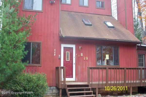 a front view of a building with windows