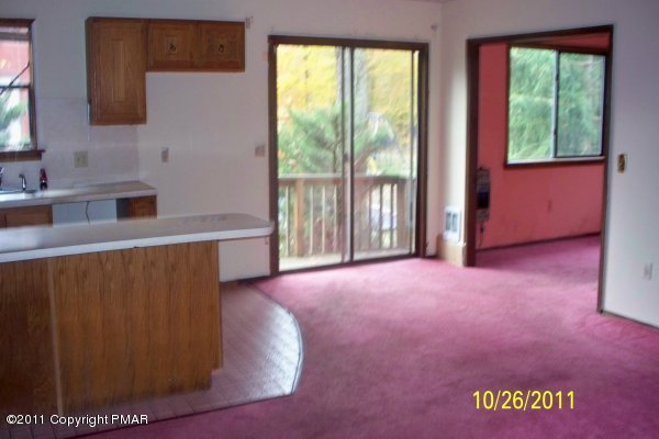 701 Edgewood Road Tobyhanna, PA 18466 - Photo 3 of 8 a view of an empty room with a window