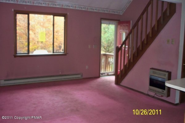 701 Edgewood Road Tobyhanna, PA 18466 - Photo 7 of 8 a view of an empty room with a window