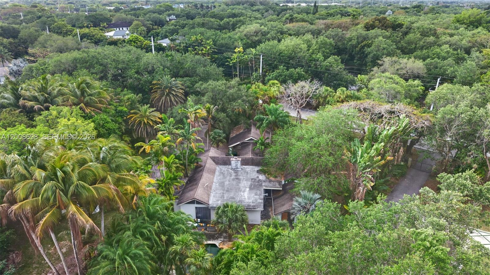 8339 Southwest 112th Street Miami, FL 33156 - Photo 11 of 30 an aerial view of a house with yard