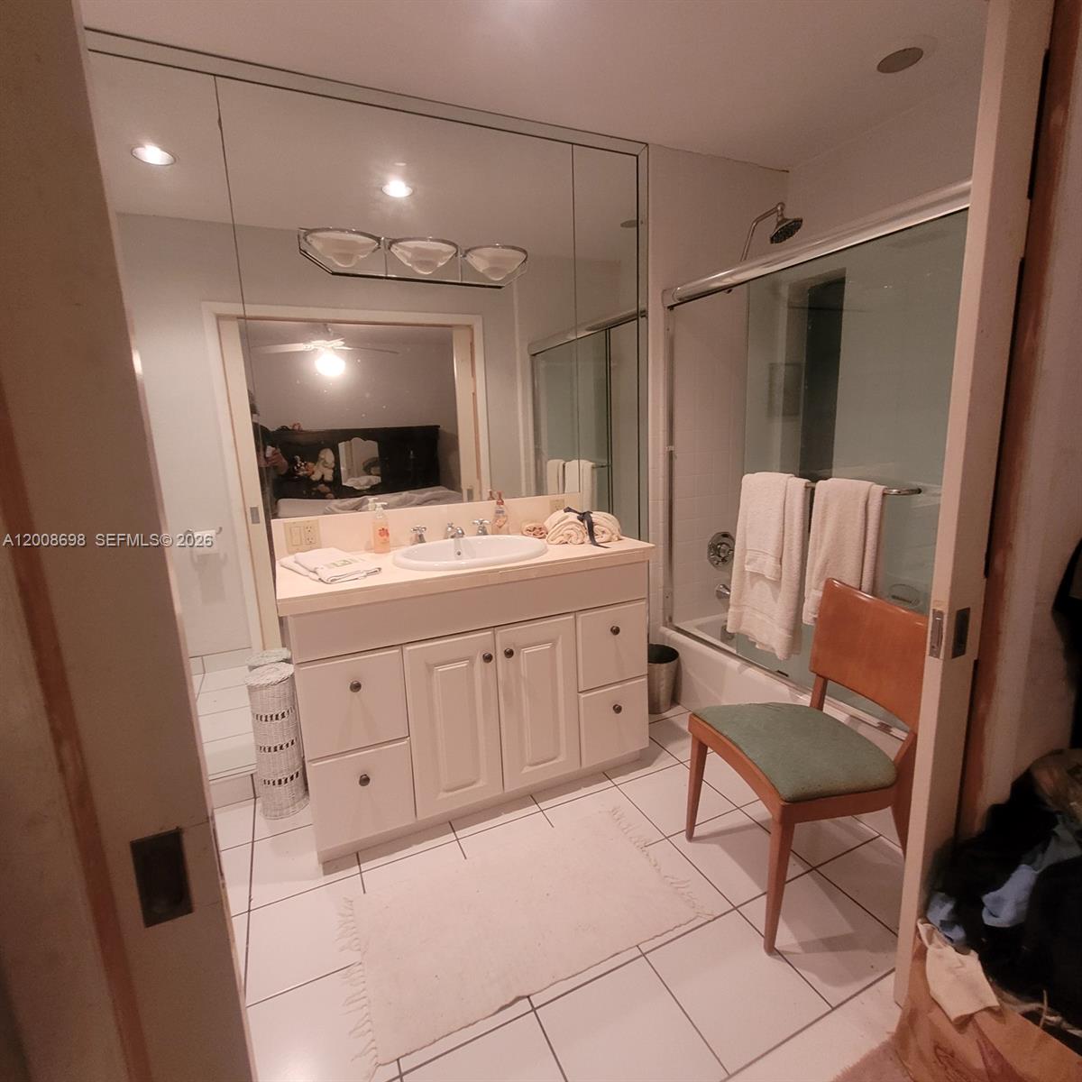 8339 Southwest 112th Street Miami, FL 33156 - Photo 15 of 30 a bathroom with a sink a toilet and a mirror