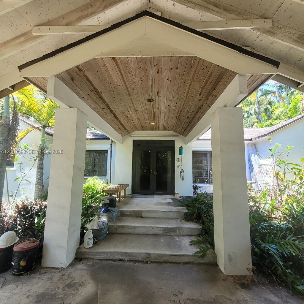 8339 Southwest 112th Street Miami, FL 33156 - Photo 25 of 30 a view of a house with potted plants