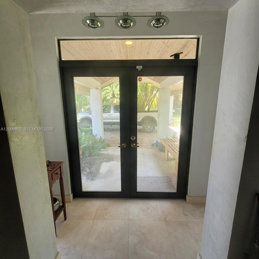8339 Southwest 112th Street Miami, FL 33156 - Photo 27 of 30 a view of front door