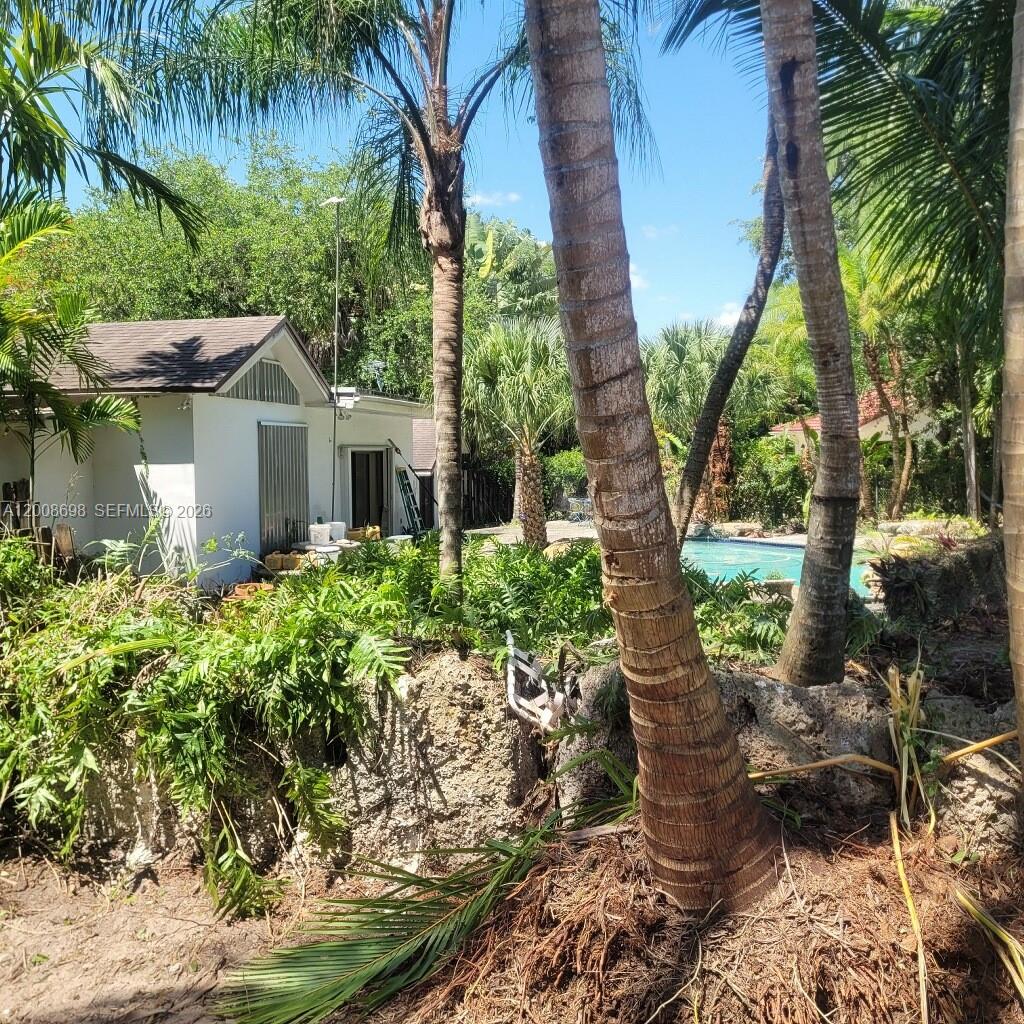 8339 Southwest 112th Street Miami, FL 33156 - Photo 30 of 30 a front view of a house with garden